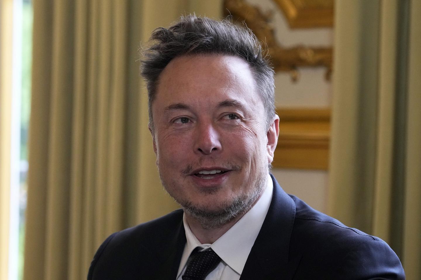 Twitter, now X. Corp., and Tesla CEO Elon Musk poses before his talks with French President Emmanuel Macron, on May 15, 2023, at the Elysee Palace in Paris. 