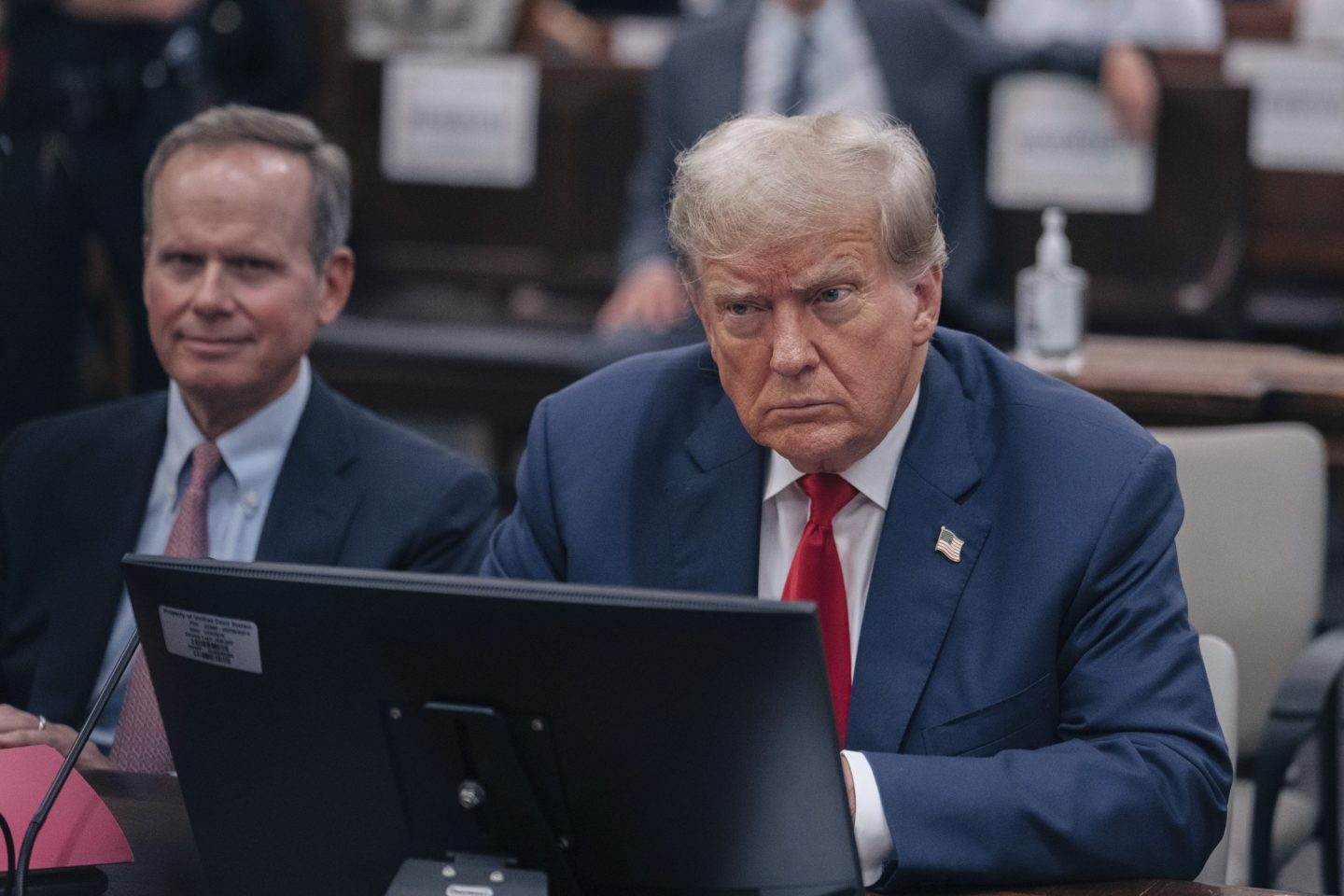 Former President Donald Trump listens during his civil fraud trial at the State Supreme Court building in New York on Wednesday.