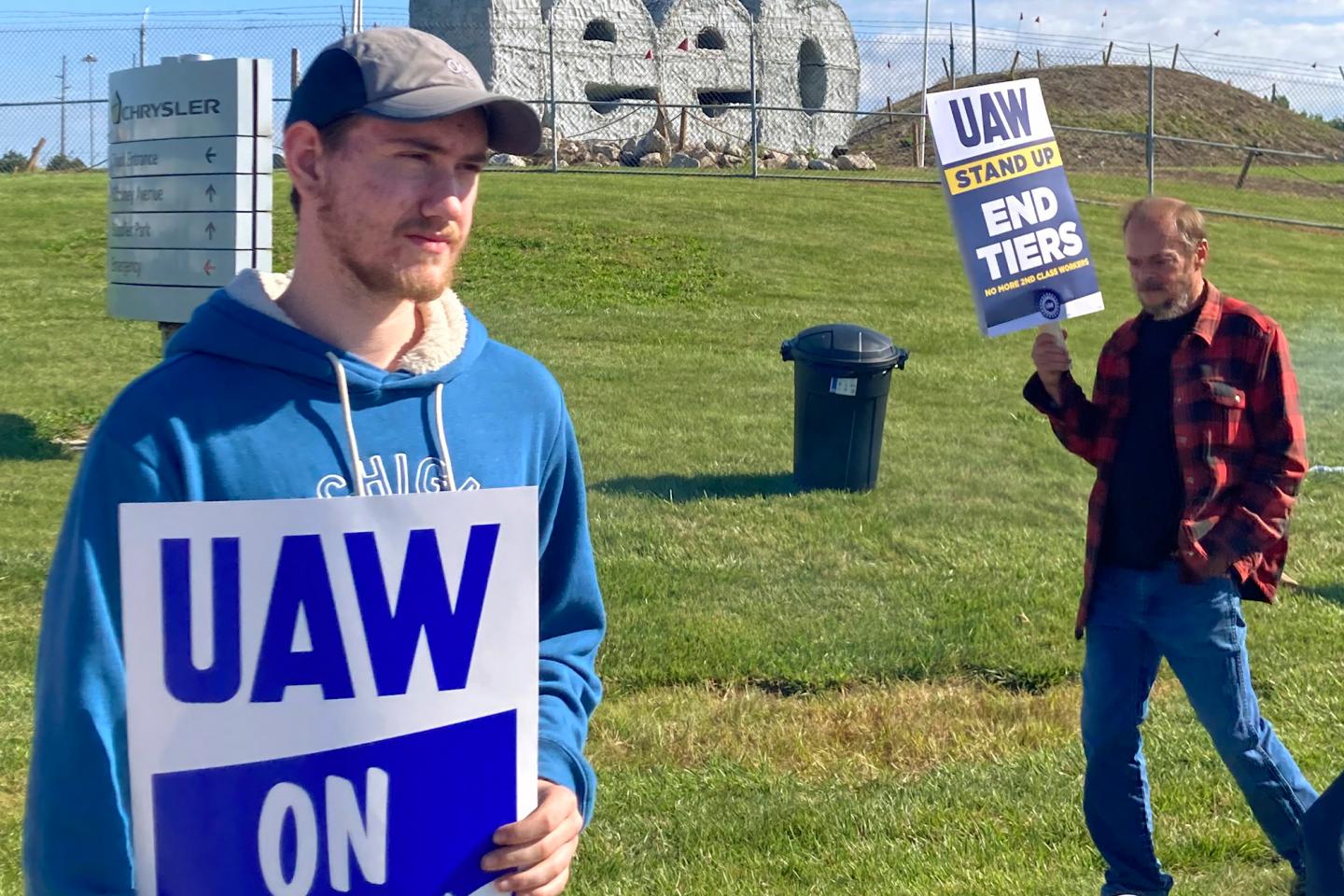 Auto workers striking outside the Stellantis plant that makes Jeeps.