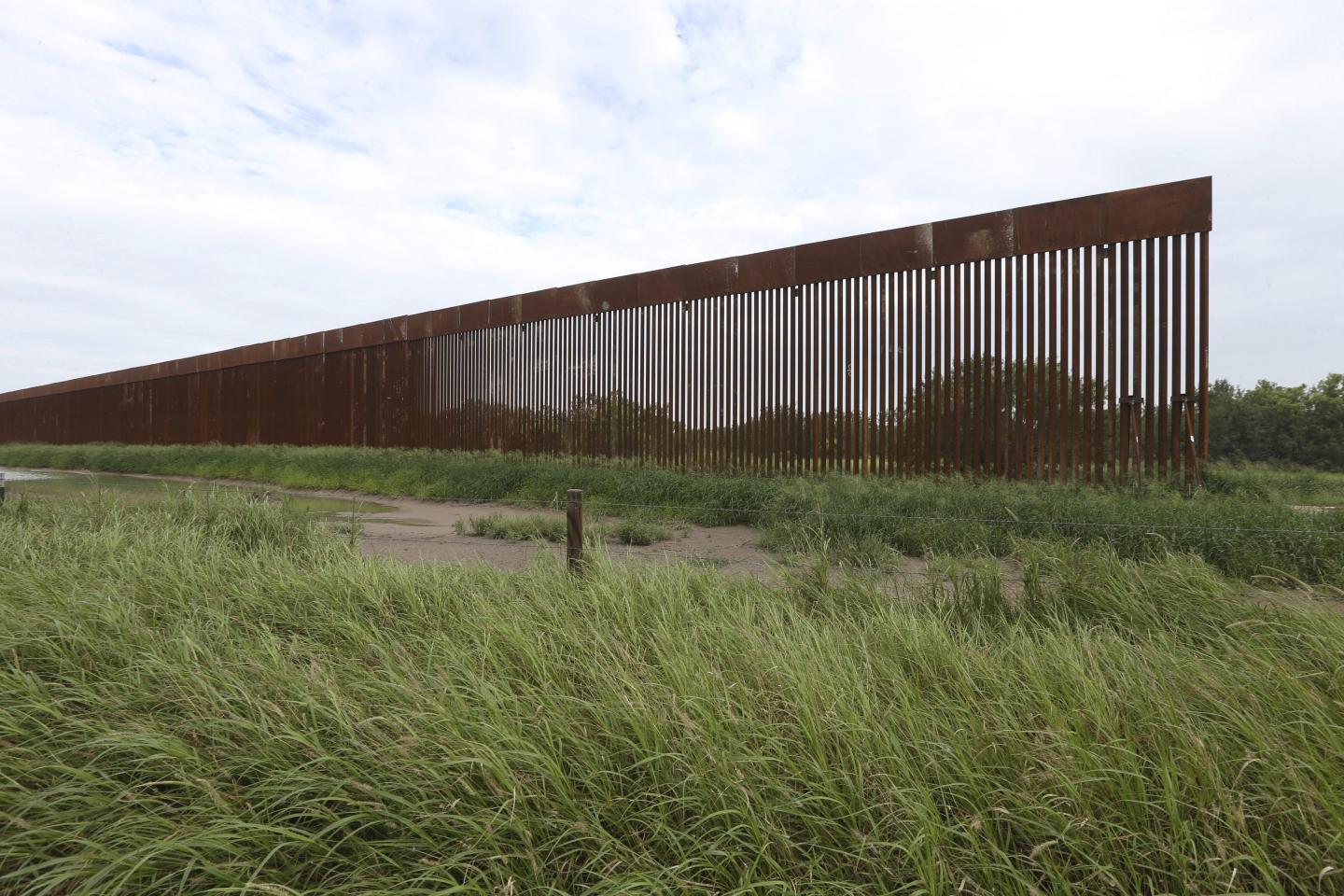 Biden administration is waiving 26 federal laws to allow more construction on the Texas border wall