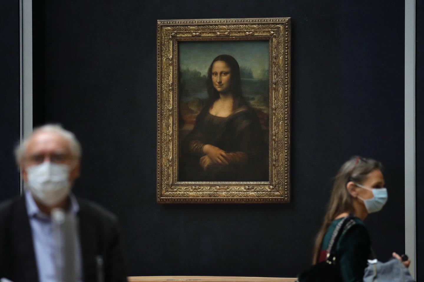 Leonardo da Vinci's "Mona Lisa" on display in the Louvre.