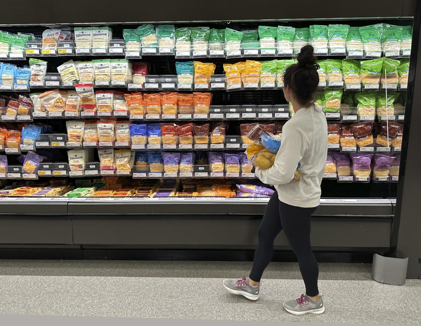 Americans are sinking in debt as household expenses grow faster than income, new poll says. ‘The economy is good on paper, but I’m not doing great’