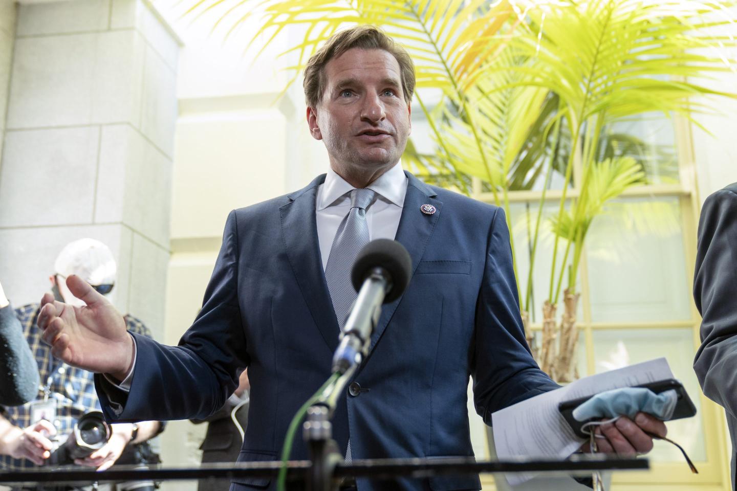 Dean Phillips speaking with reporters
