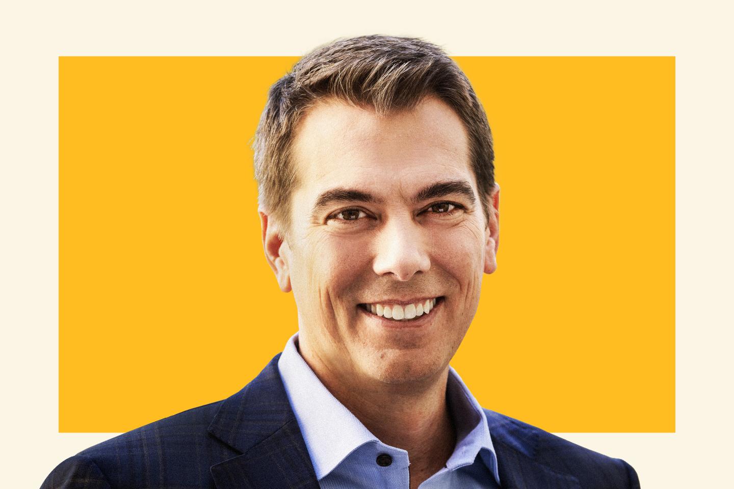 man in collared shirt and suit jacket
