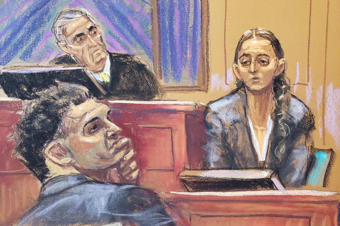 Court sketch of Caroline Ellison testifying as Sam Bankman-Fried watches during his trial in New York.