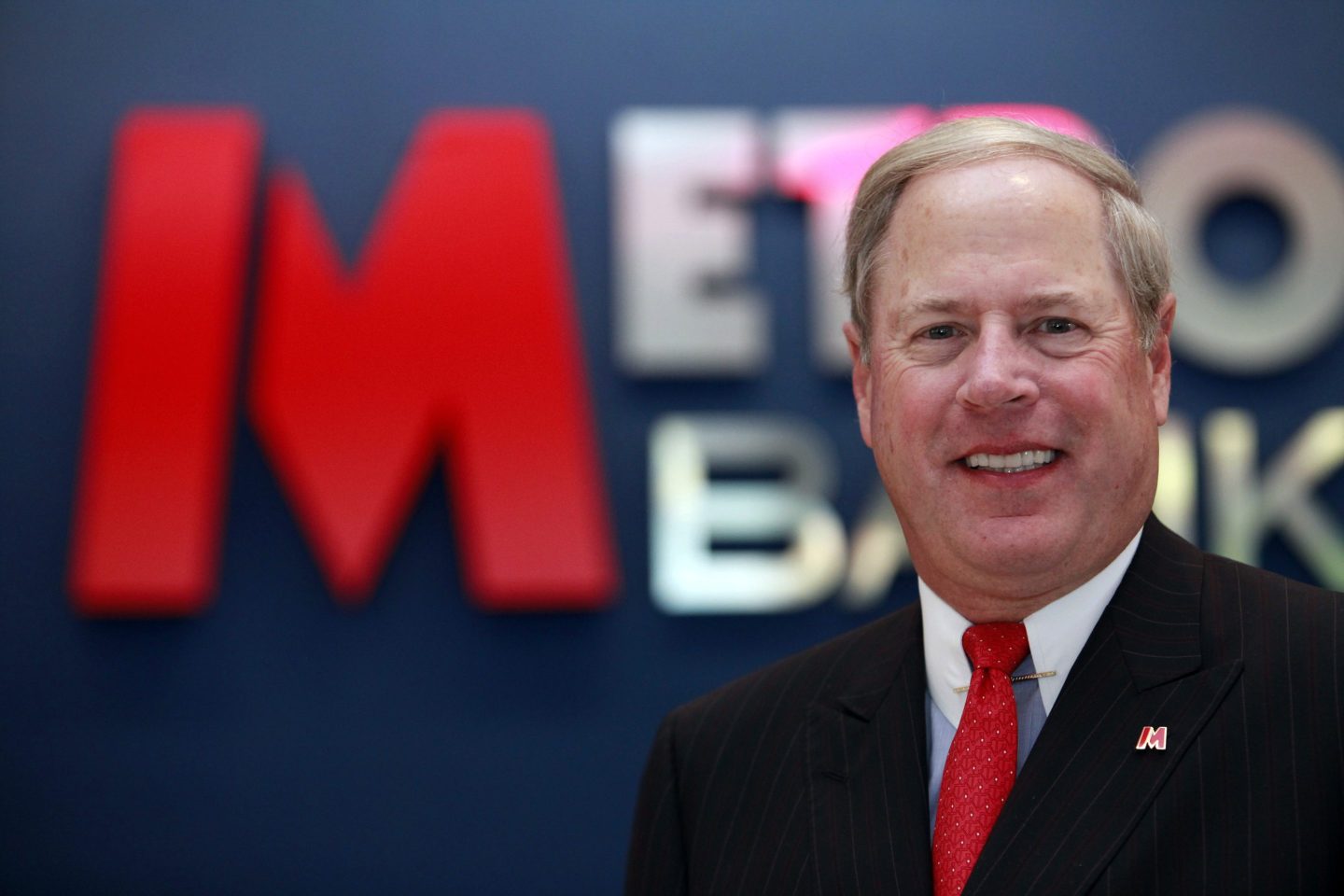 Vernon Hill, vice chairman and a co-founder of Metro Bank, poses for photographers at the bank's opening in London, U.K., on Thursday, July 29, 2010.