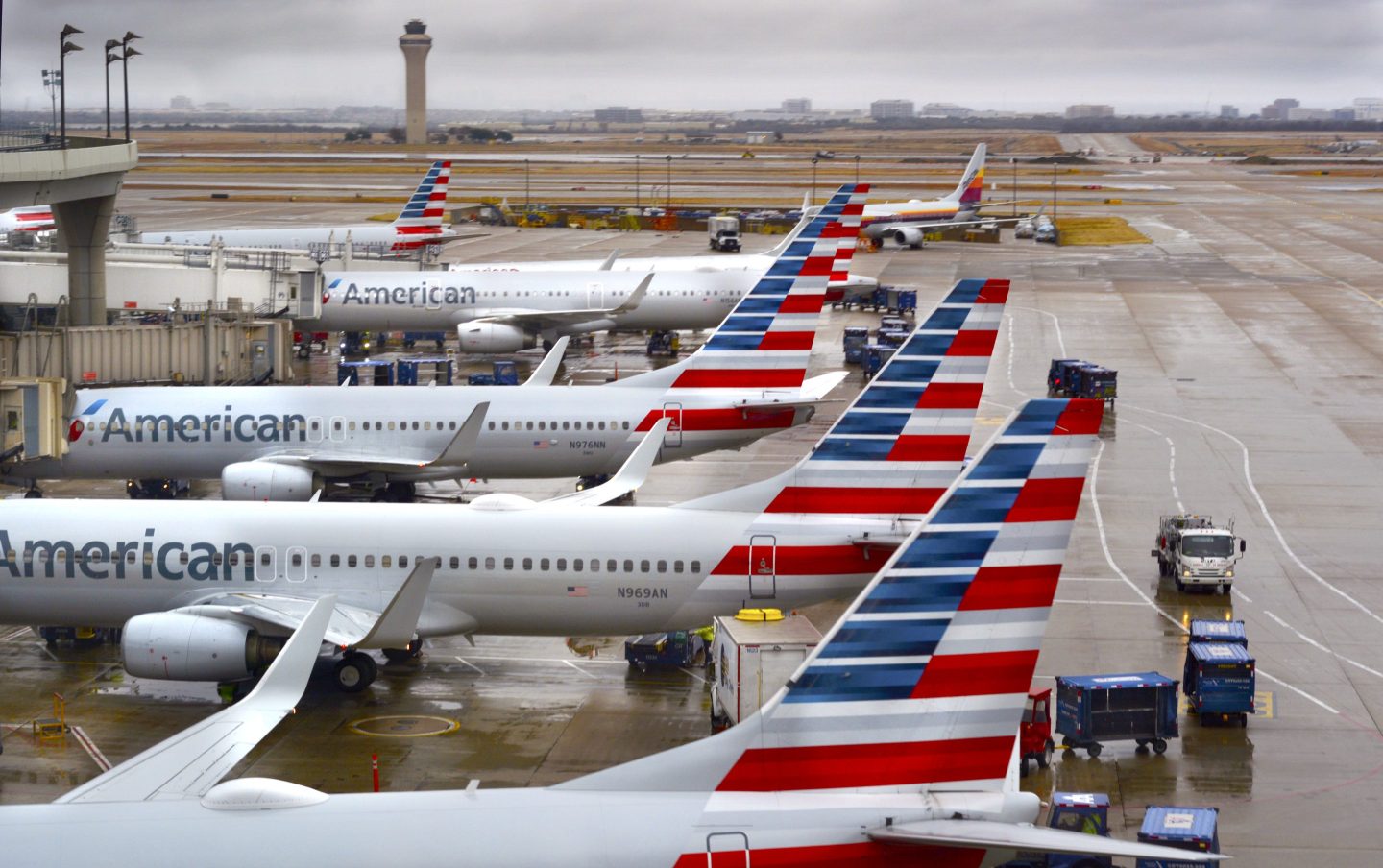 American Airlines passenger jets parked at their gates