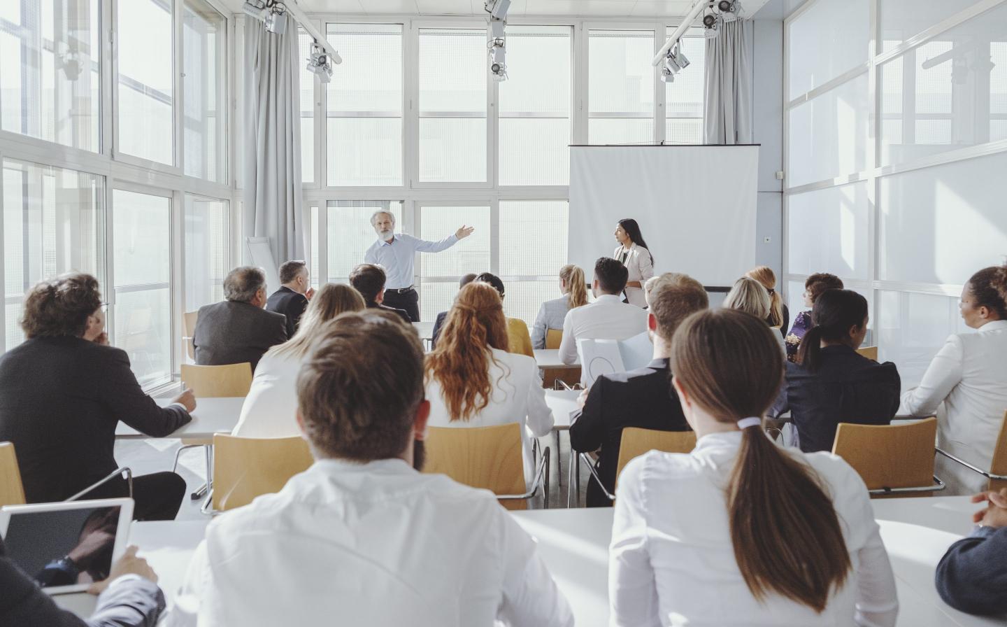 Employees in a meeting in a conference room