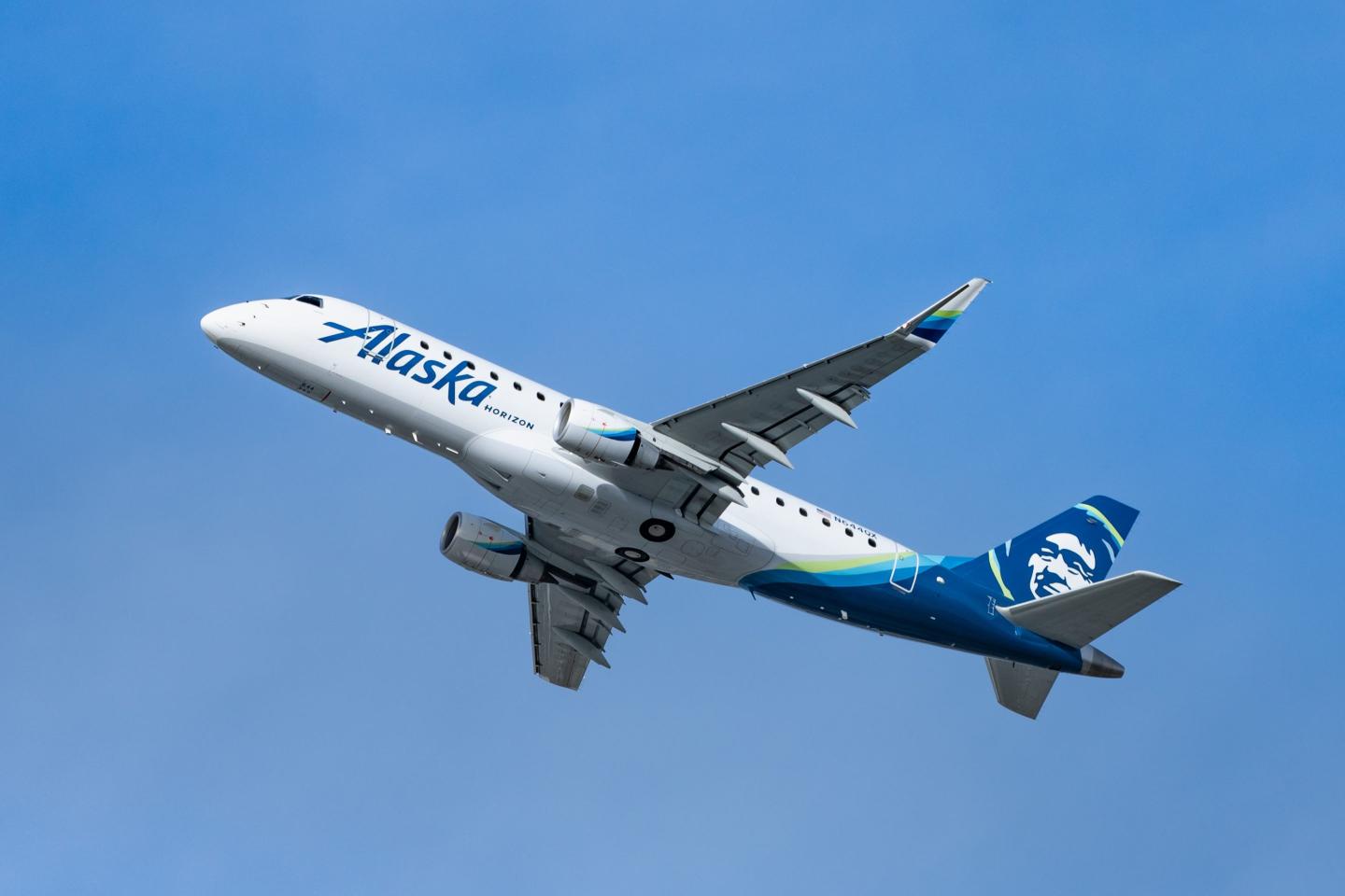 An off-duty pilot tried to shut down the engines of a flight to San Francisco in midair and had to be subdued, authorities say