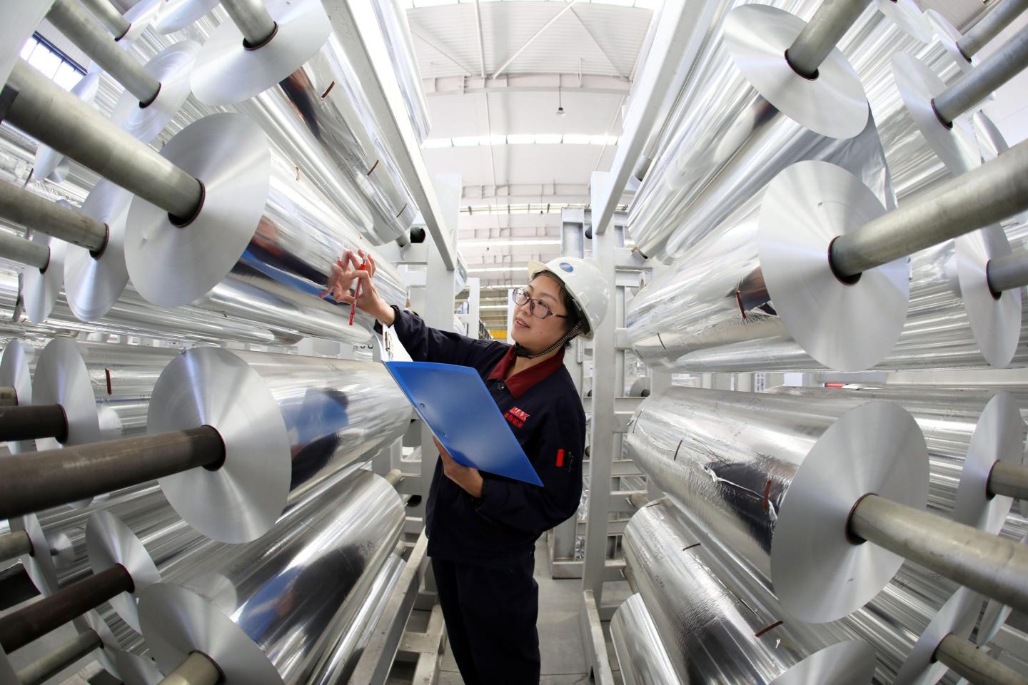 A worker in an aluminum products factory in China