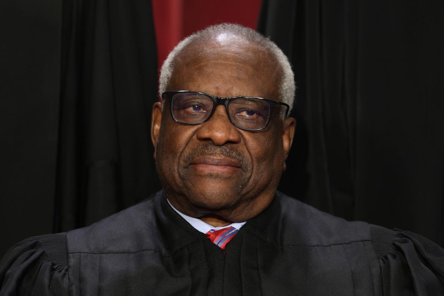 Supreme Court Justice Clarence Thomas poses for an official portrait at the East Conference Room of the Supreme Court building