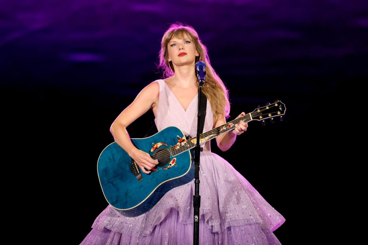 Taylor Swift’s tour movie is as big of a hit as her concerts as the film breaks a more than decade-old box office record