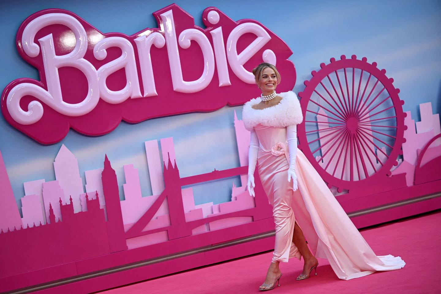Australian actress Margot Robbie poses on the pink carpet upon arrival for the European premiere of "Barbie" in central London on July 12, 2023.
