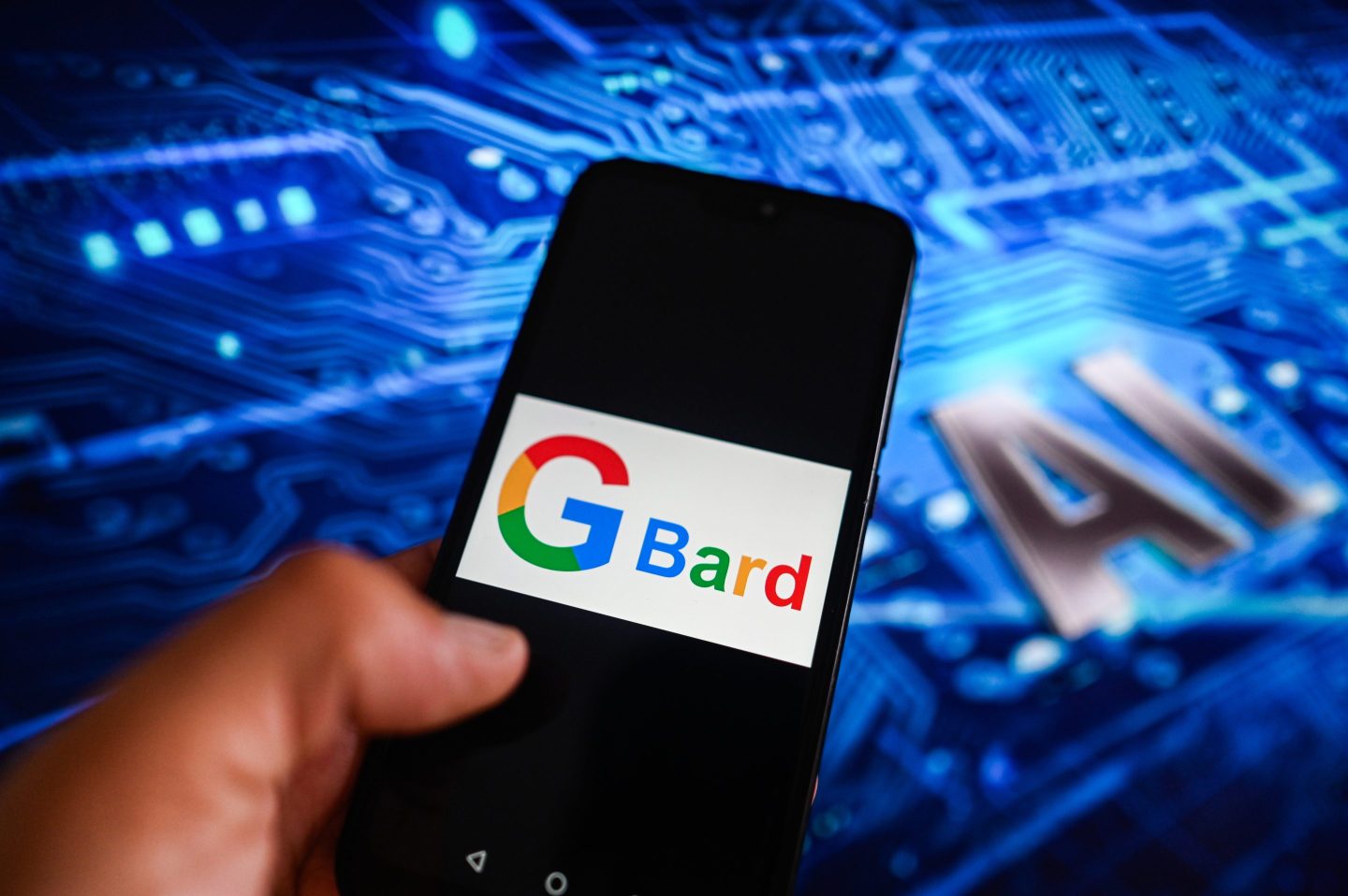 Google Bard logo is displayed on a smartphone