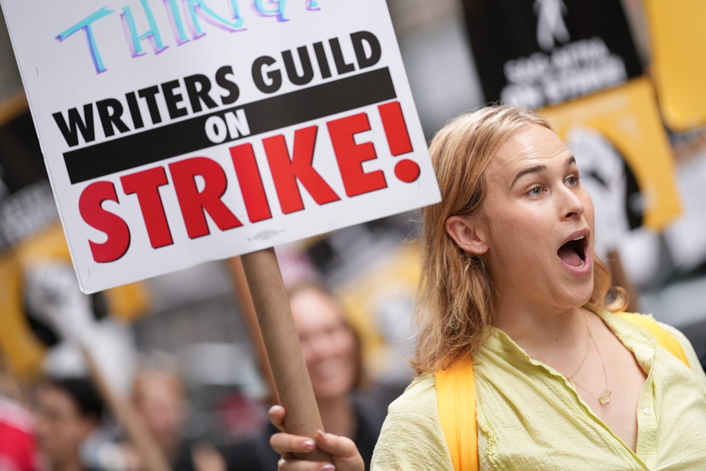 Tommy Dorfman joins SAG-AFTRA members as they maintain picket lines in front of Netflix on August 24, 2023 in New York City.