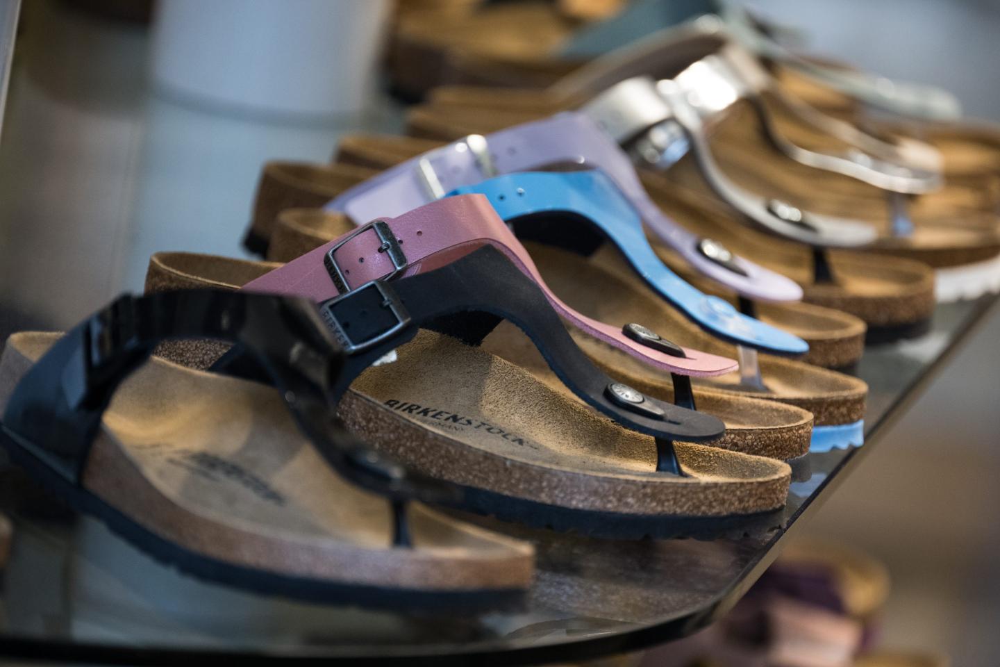 a row of sandals on a table