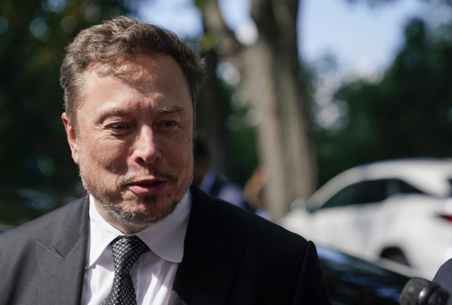 Tesla warns that a federal probe into whether it exaggerated the range of its cars may lead to a ‘material adverse impact on our business’