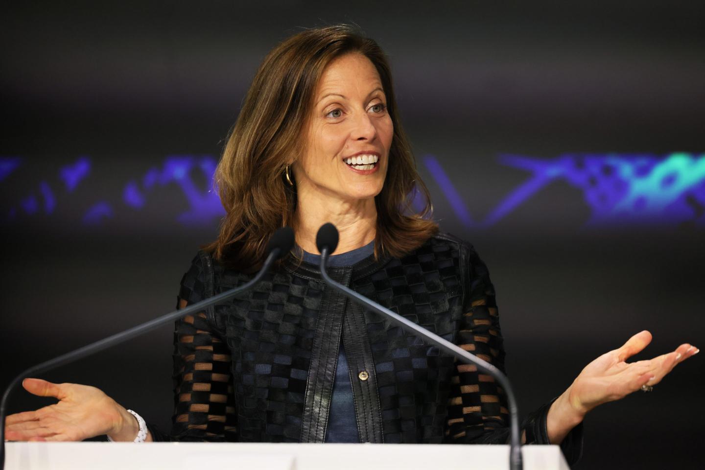 woman speaking onstage