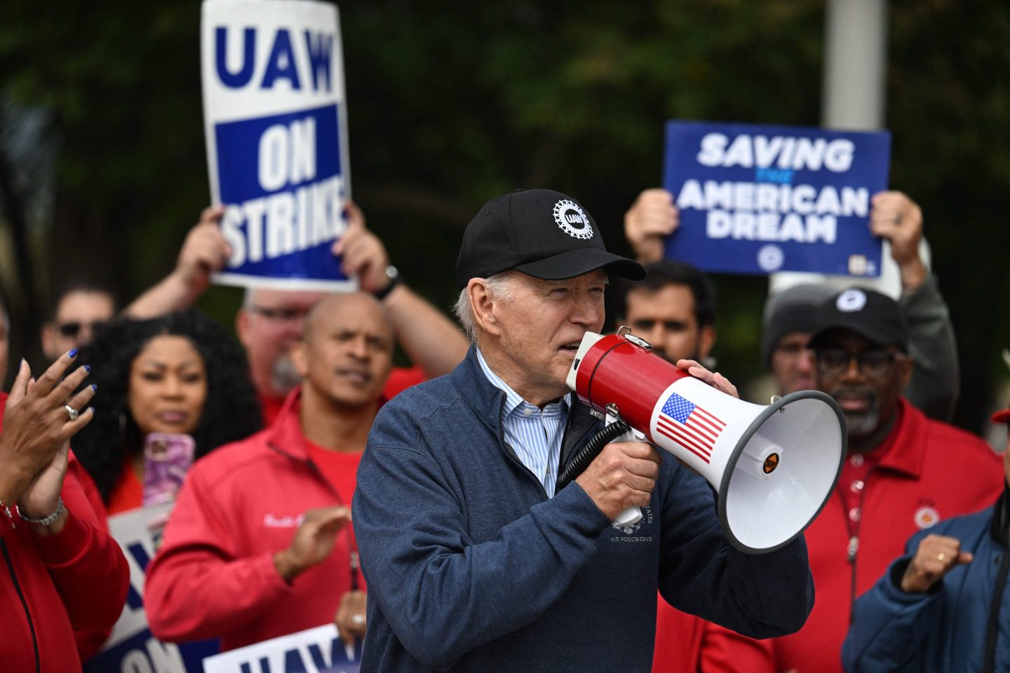 President Joe Biden addresses striking members of the United Auto Workers (UAW) union at a picket line outside a General Motors Service Parts Operations plant in Michigan on Sep. 26.