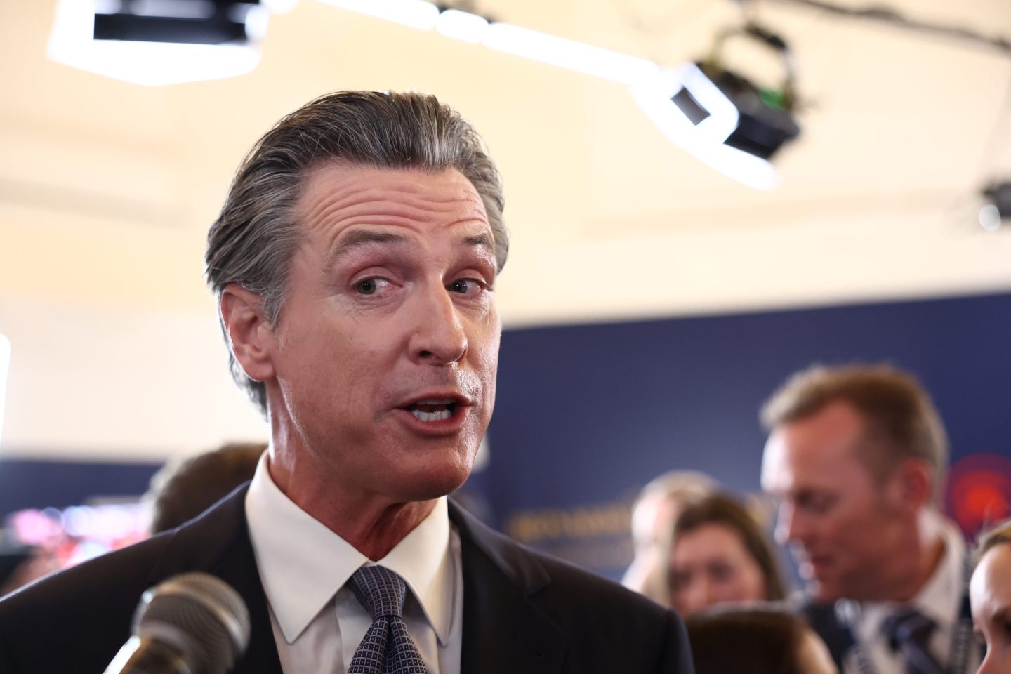 California Gov. Gavin Newsom talks to reporters