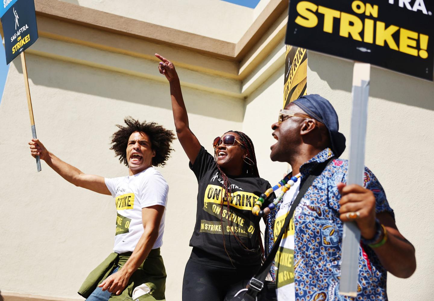 Union members picket outside Paramount Studios in Los Angeles.