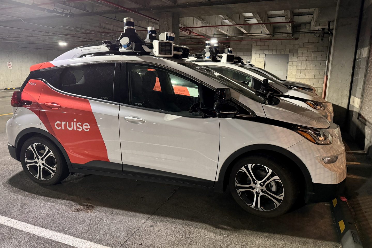 'Cruise' driverless robot taxis are seen at a parking lot as California Department of Motor Vehicles (DMV) revokes its self-driving car permit and citing 'unreasonable risk to public safety' in San Francisco, on Oct. 24, 2023.