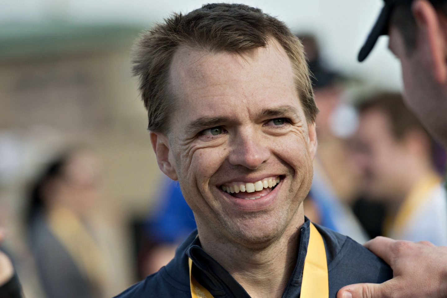 Todd Combs chats with attendees after the "Berkshire Hathaway Invest In Yourself 5K" race on the sidelines of the Berkshire Hathaway shareholders meeting on May 4, 2014.