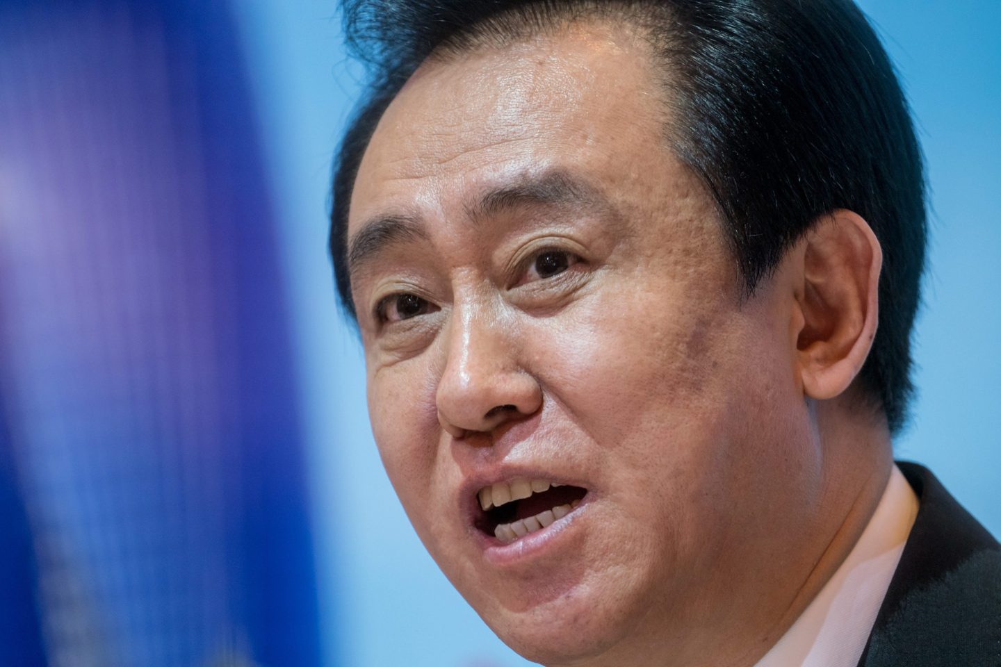 Hui Ka Yan, chairman of China Evergrande Group, speaks during a news conference in Hong Kong, China, on Monday, March 26, 2018.