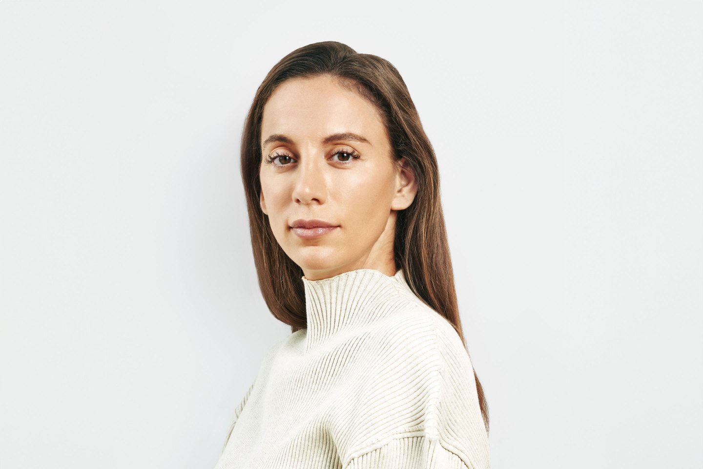 woman wearing a white sweater