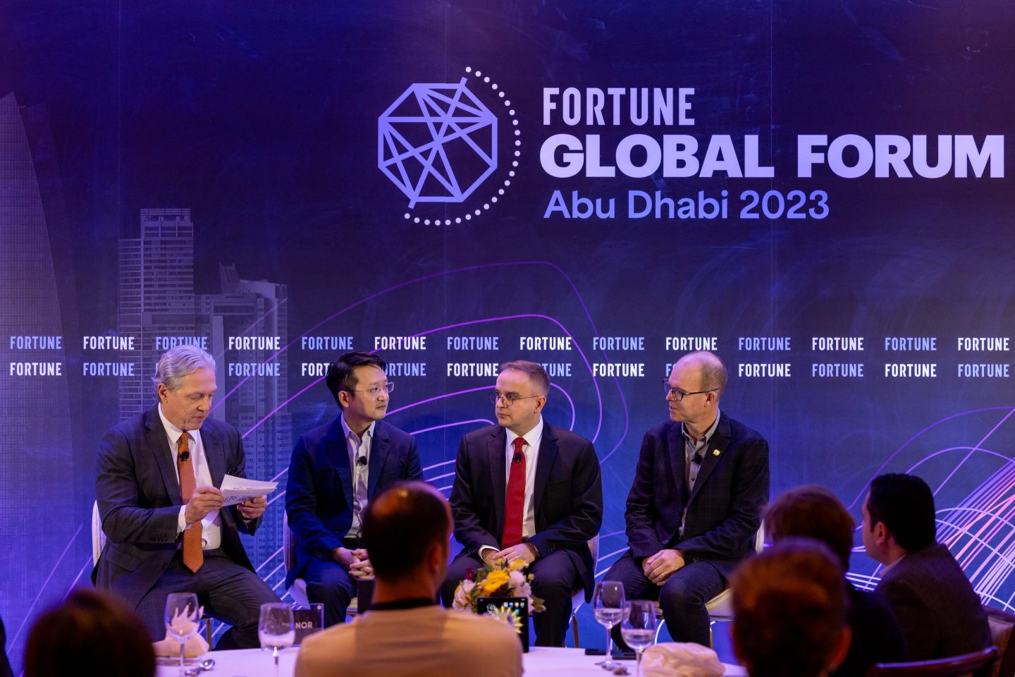 A lunch session hosted by HONOR on 'What's Next for Smart Devices?' at the Fortune Global Forum on Nov. 27 in Abu Dhabi. From left: Clay Chandler, executive editor, Asia, Fortune; Dr. Ray Guo, chief marketing officer, HONOR; Frank Holzmann, global EVP of electrical service, TÜV Rheinland; Ben Wood, chief analyst and chief marketing officer, CCS Insight.
