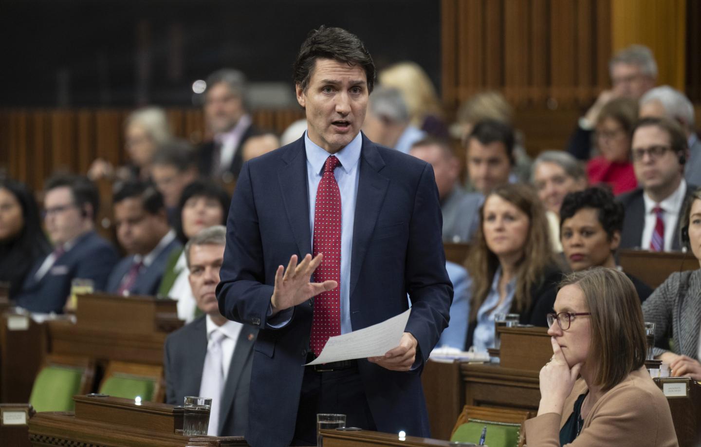 Canada Prime Minister Justin Trudeau reads a statement about the situation at the border during Question Period on Nov. 22 in Ottawa, Ontario. Two people were found dead in a vehicle that exploded at a checkpoint on the American side of a U.S.-Canada bridge in Niagara Falls, Wednesday, a law enforcement official told The Associated Press.