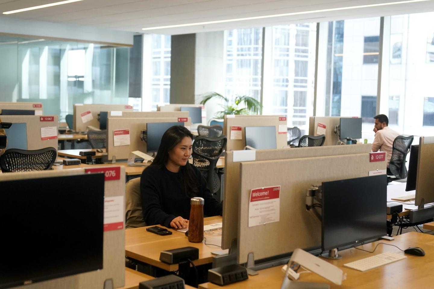 People work at the Yelp office in San Francisco on Feb. 14, 2023. 