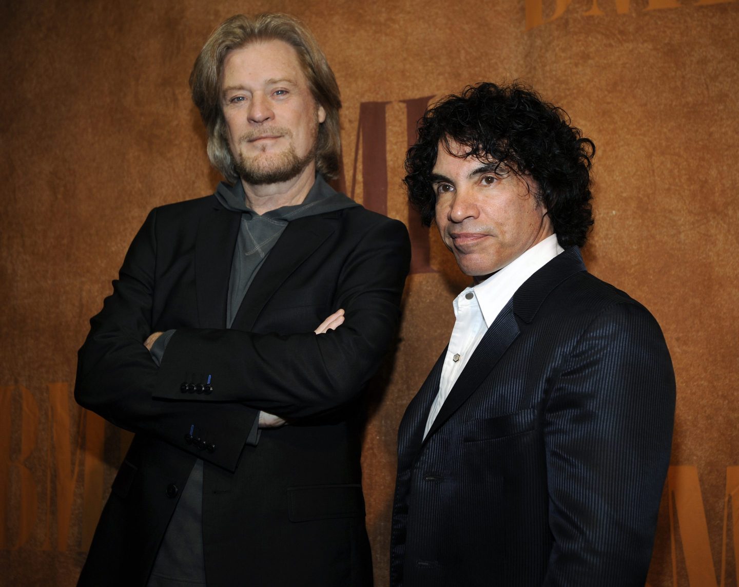 Daryl Hall, left, sued his longtime music partner John Oates, right, arguing that his plan to sell off his share of a joint venture would violate a business agreement the duo had.