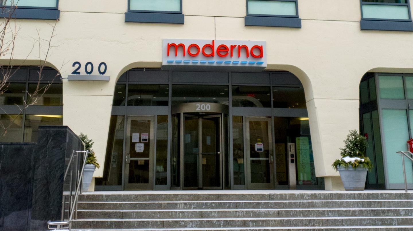 Facade with logo and snow at headquarters of pharmaceutical company Moderna in Cambridge, Massachusetts