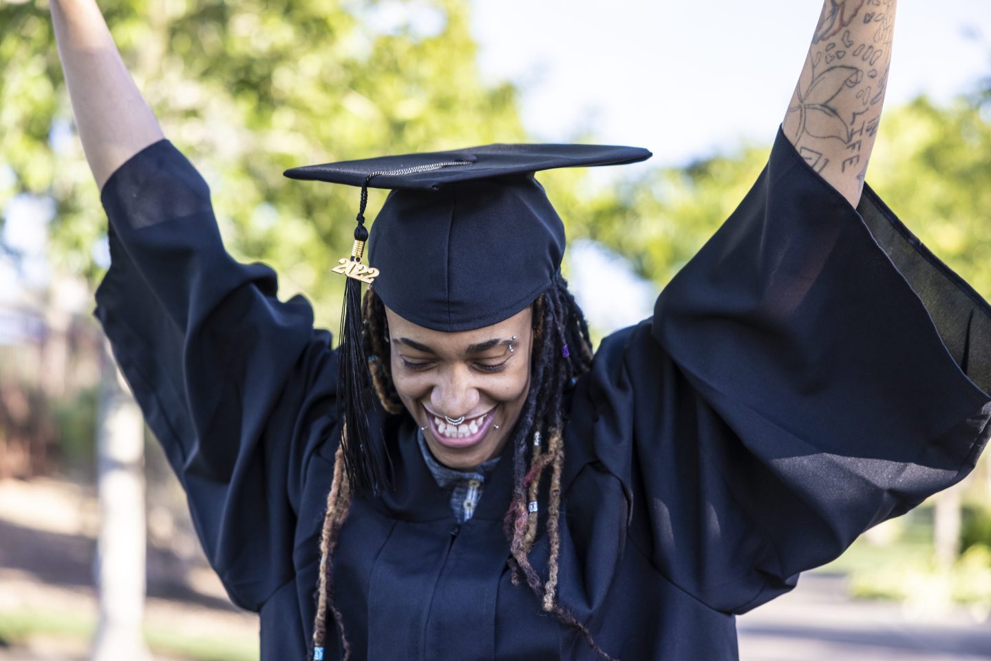 A woman on graduation day cheering