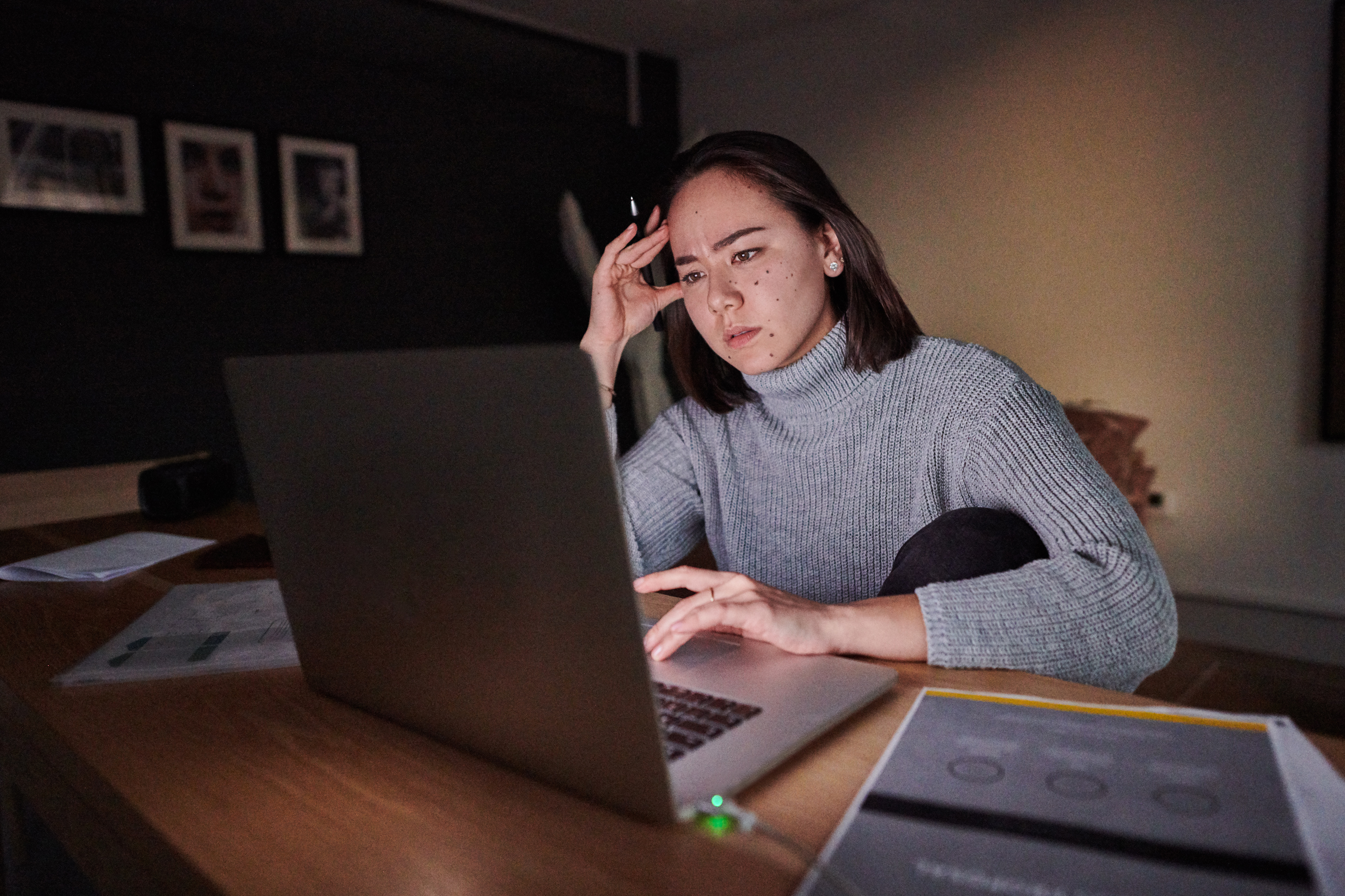 An unhappy woman on a zoom call. 