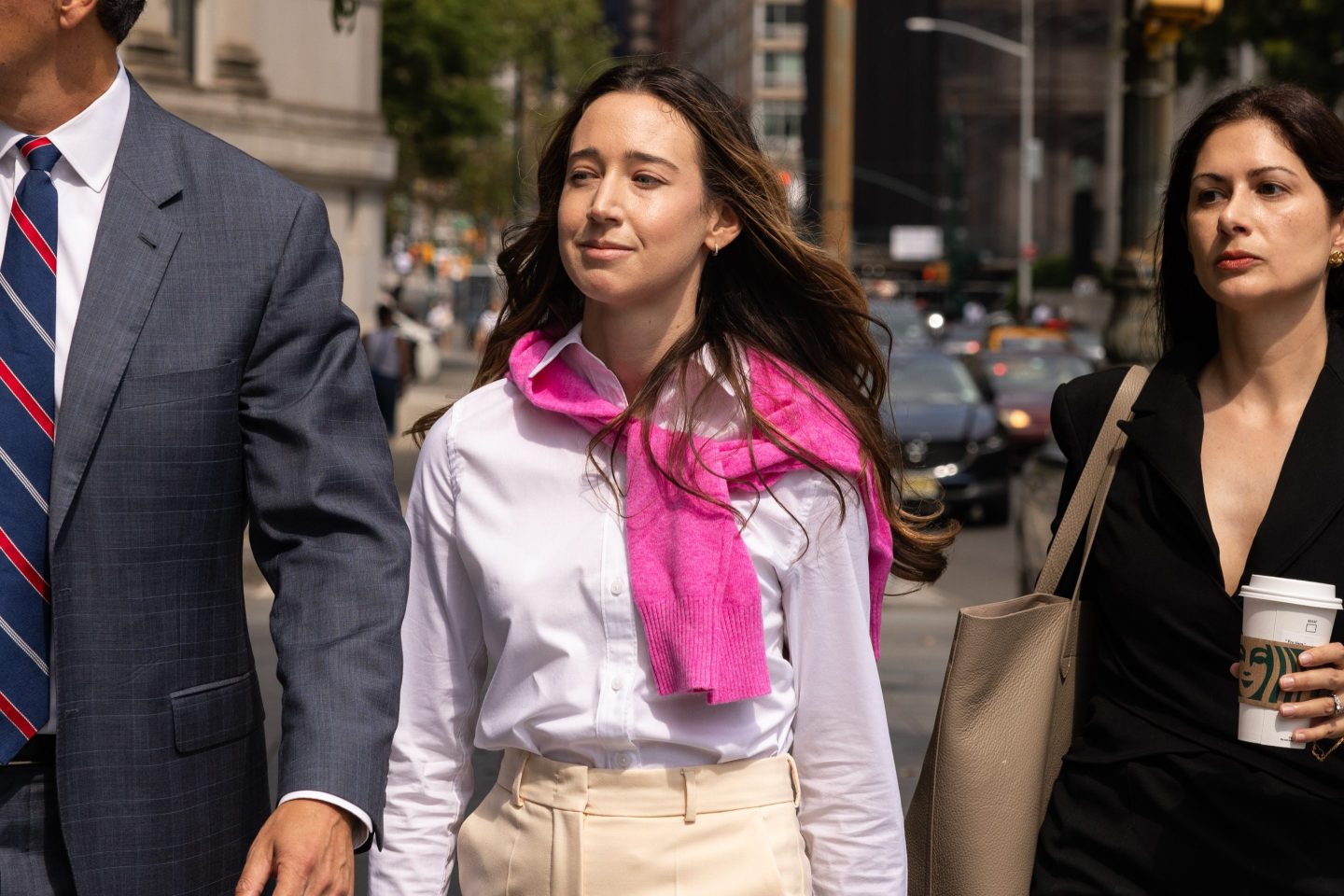 Charlie Javice, founder of Frank, center, arrives at federal court in New York on July 13, 2023.