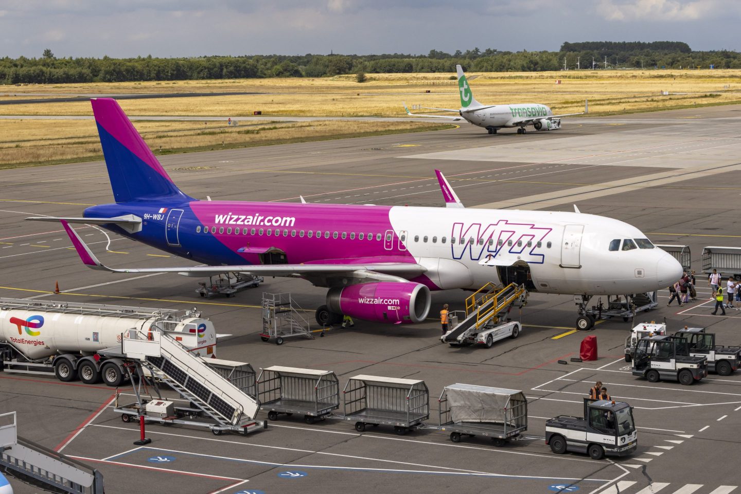 Wizz Air flight on the ground seen in an airport
