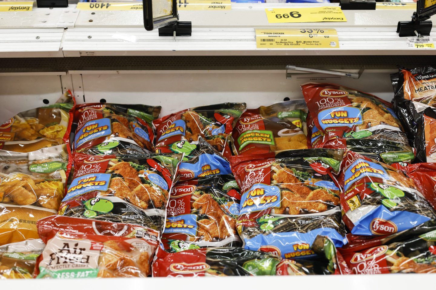 Tyson Foods frozen chicken products sit in refrigerated section of a Safeway store