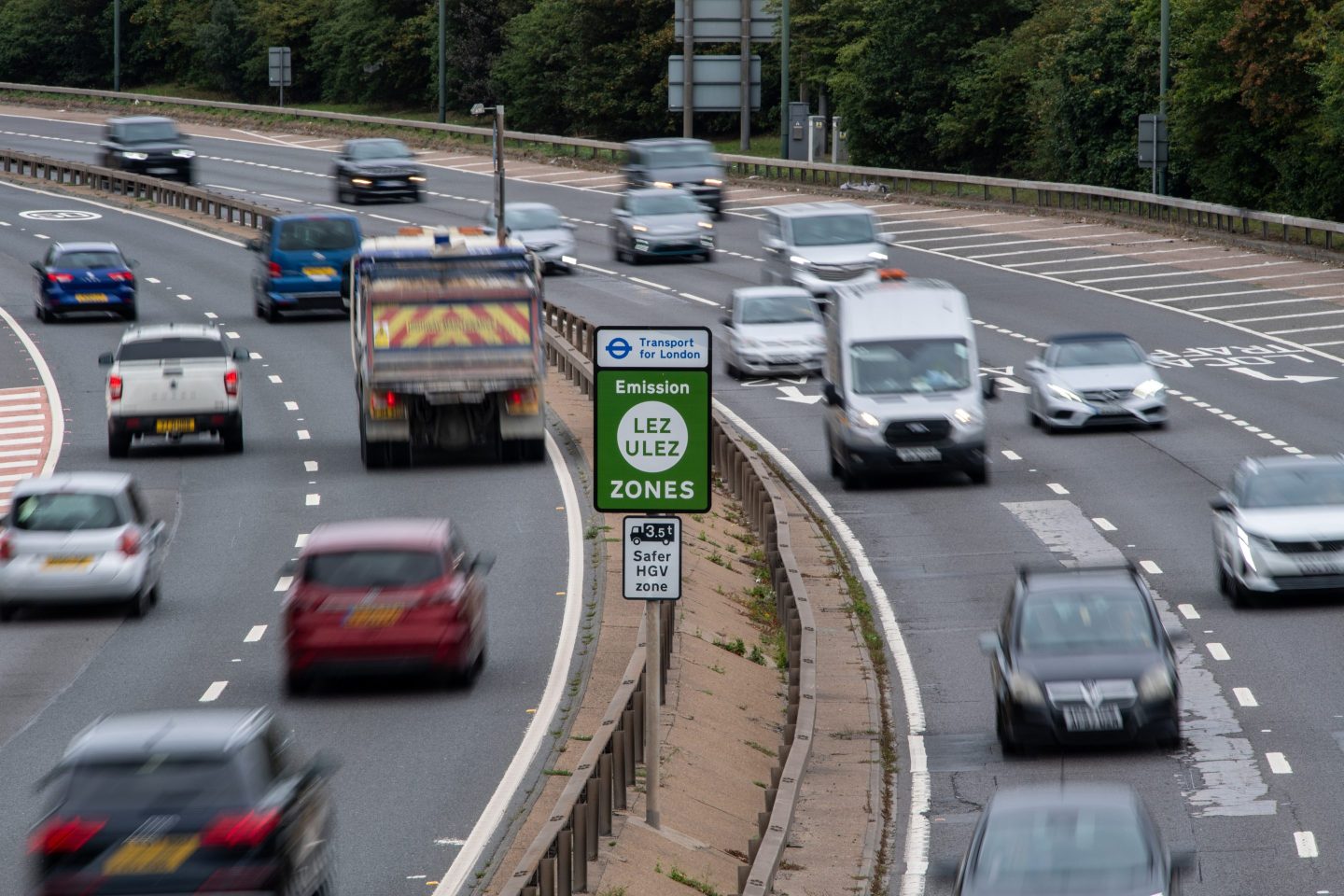 A sign warns motorists of the newly expanded Ultra Low Emission Zone (ULEZ) boundary in the Bexleyheath district of London, UK, on Tuesday, Aug. 29, 2023. Every driver in London, as of Tuesday, is now subject to strict pollution rules, completing one of the world&#8217;s most ambitious vehicle emissions policies and taking the British capital closer to having healthy air. Photographer: Chris J. Ratcliffe/Bloomberg via Getty Images