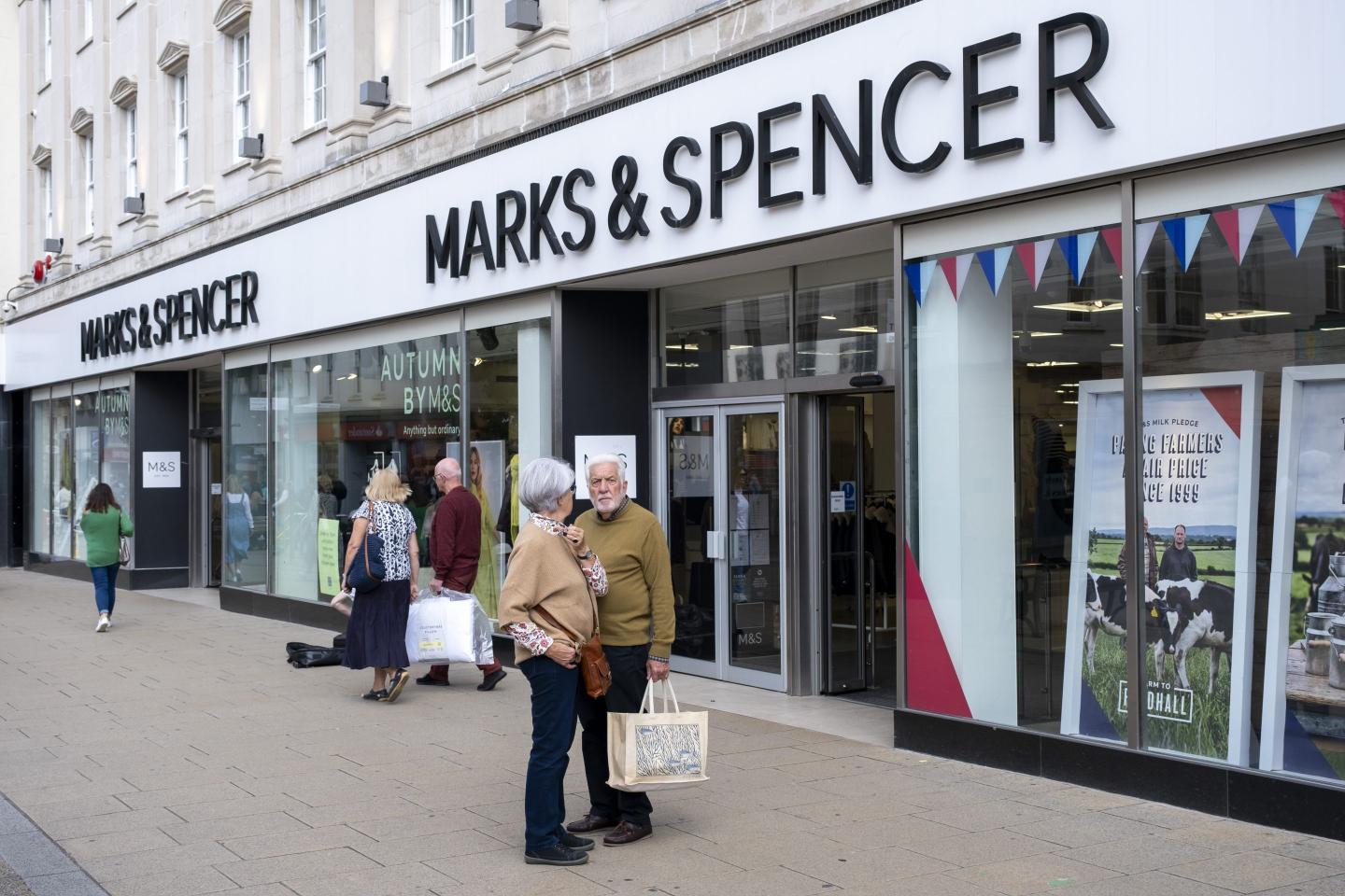 People outside a Marks & Spencer store