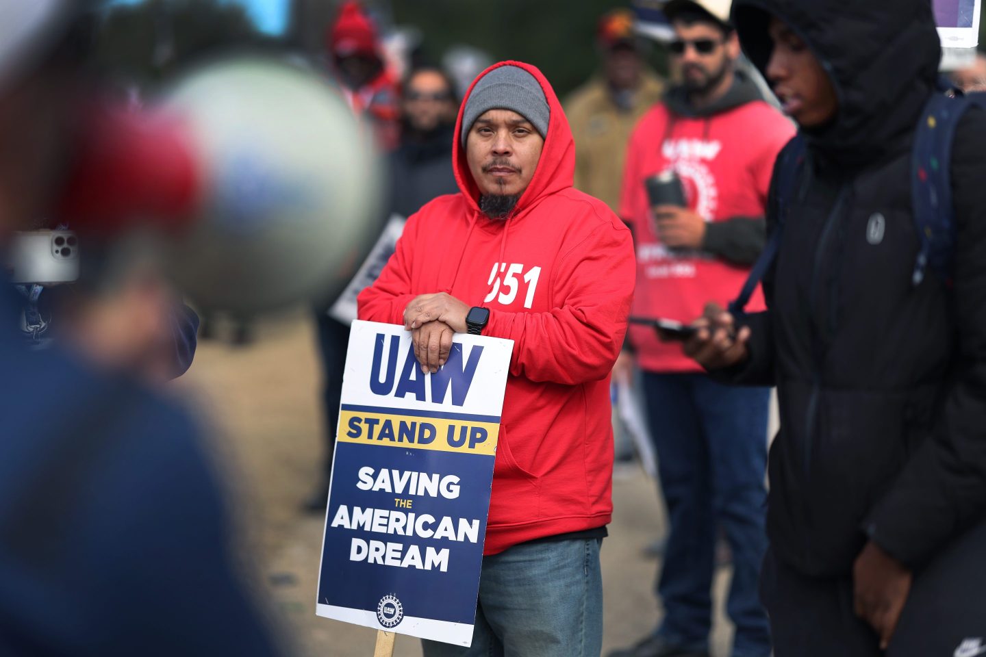 Members of UAW Local 551, in Chicago, picket on Oct. 10. The local, which represents workers at a Chicago Ford plant, voted in favor of the agreement last week.