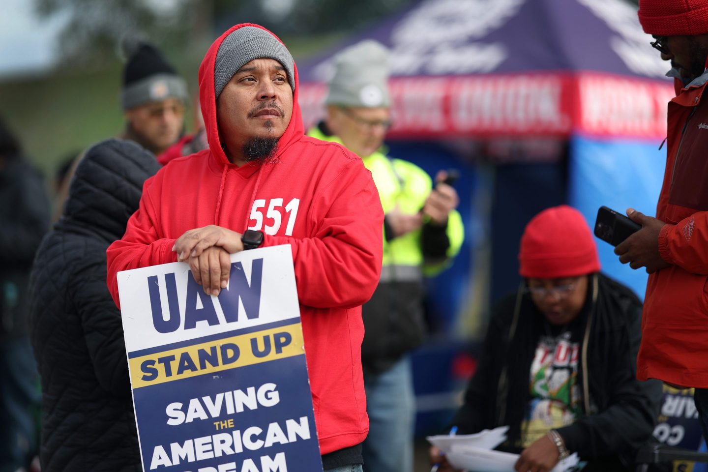 Workers picket outside of the Ford Assembly plant.