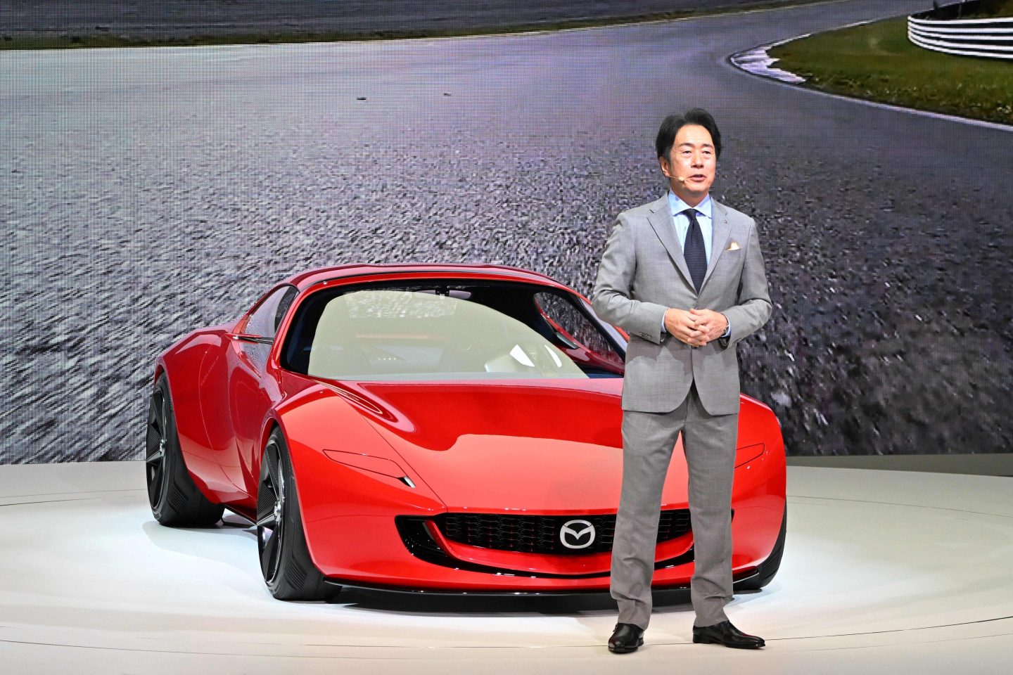 Mazda Motor President and CEO Masahiro Moro says he's letting consumer demand dictate his company's EV goals.