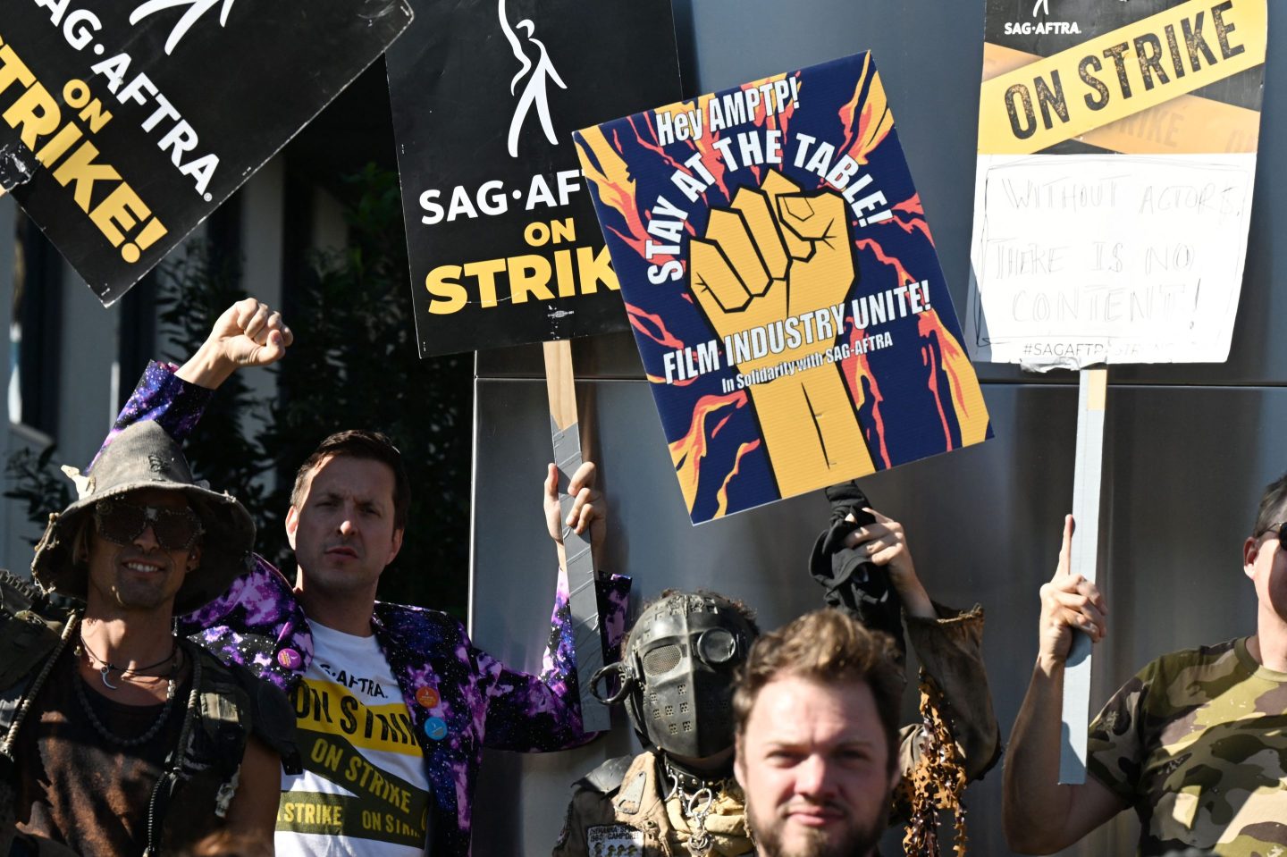 SAG-AFTRA members and their supporters picket outside Netflix.