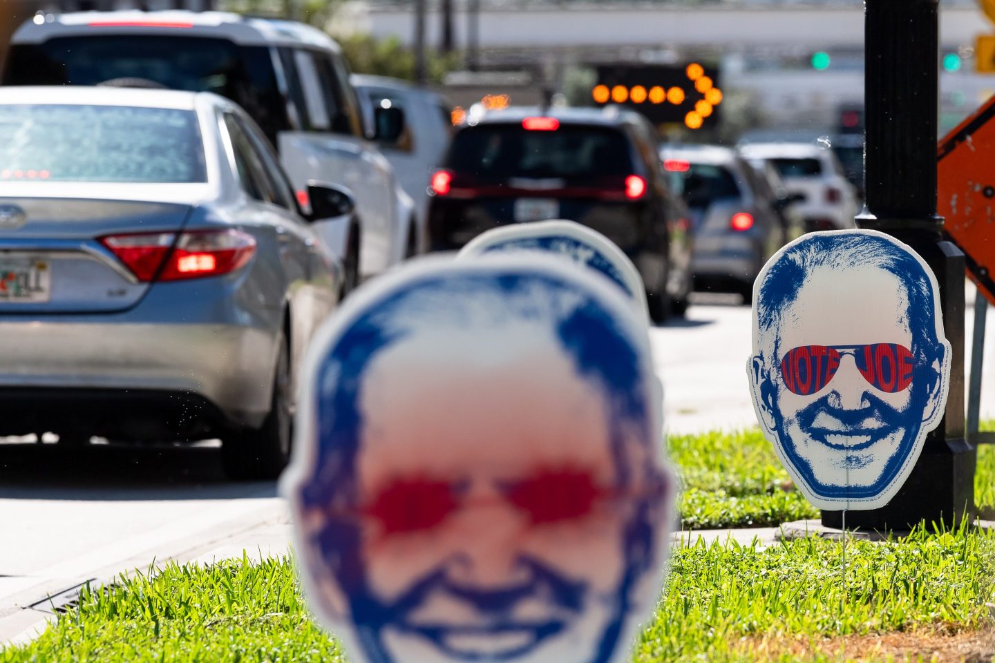 "Dark Brandon" signs are seen in Miami on Nov. 8, 2023.