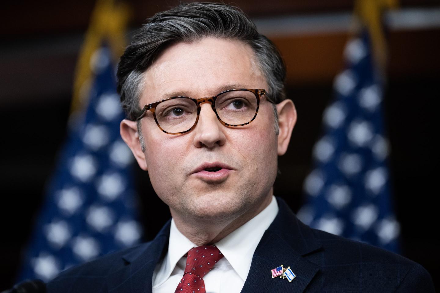 House vote averts a government shutdown after Democrats help GOP Speaker Johnson pass a temporary funding bill without far-right support