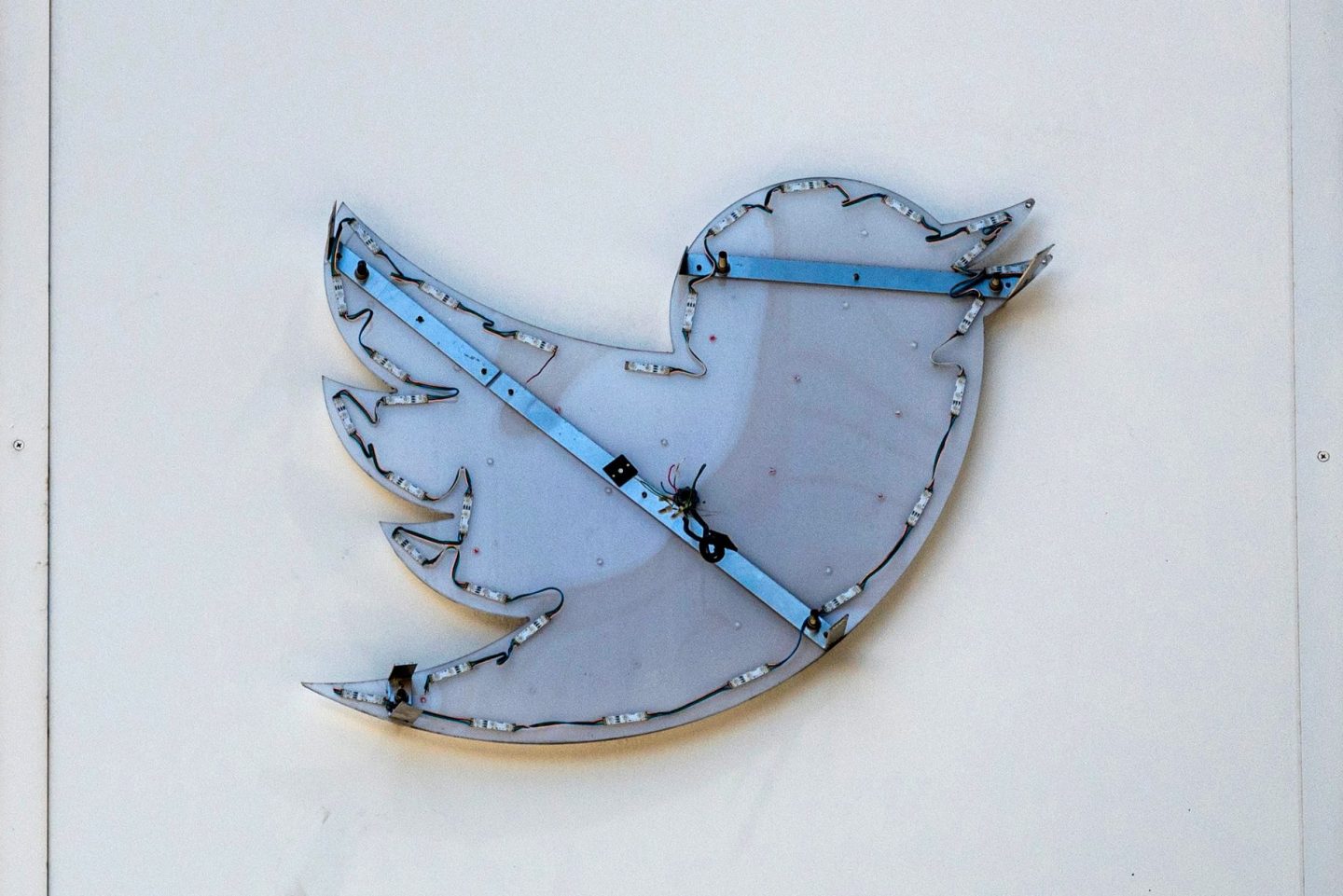 A partially removed sign at Twitter headquarters in San Francisco in July 2023.