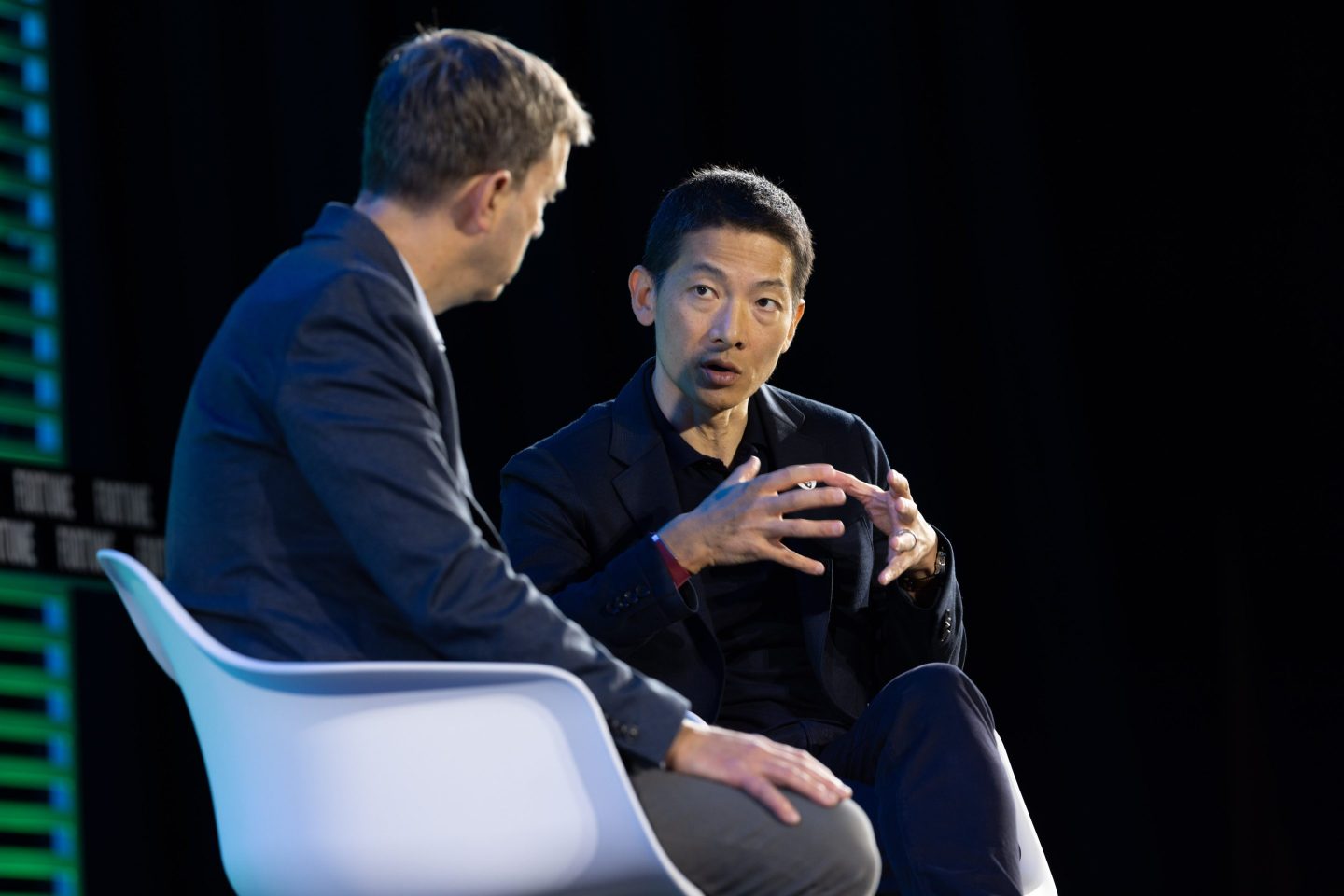 G24 CEO Peng Xiao onstage at Fortune's Global Forum