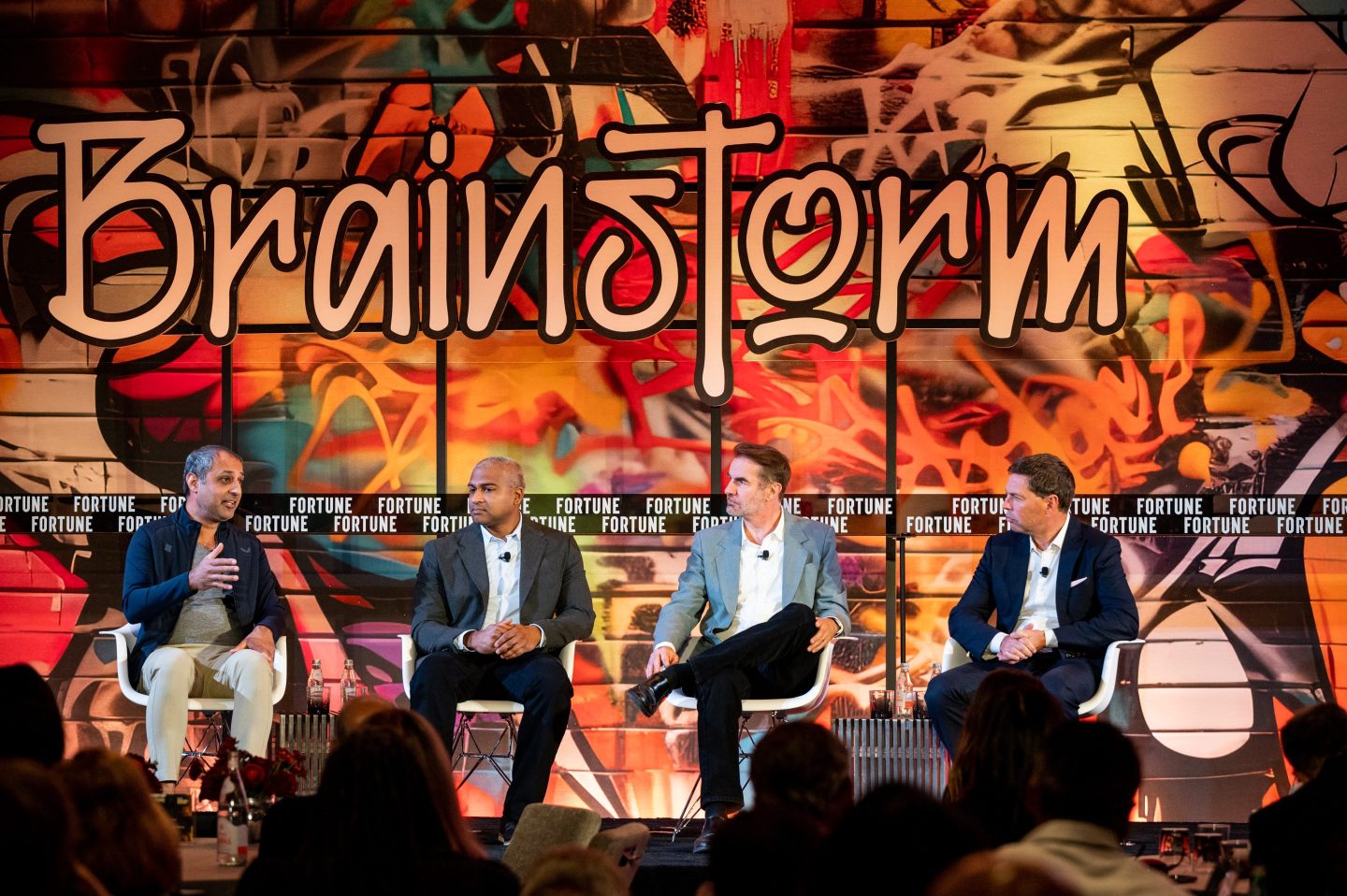 Atif Rafiq, Shane Luke, Erik Brynjolfsson, and Jeff John Roberts onstage at Coins2Day Brainstorm AI.